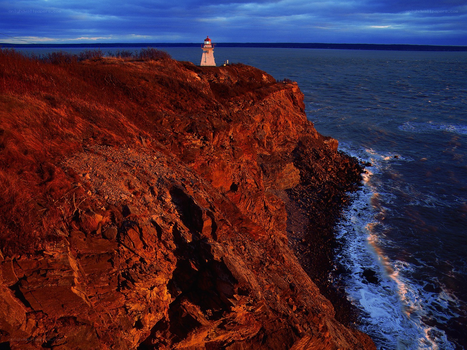 Lighthouse on a rocky cliff