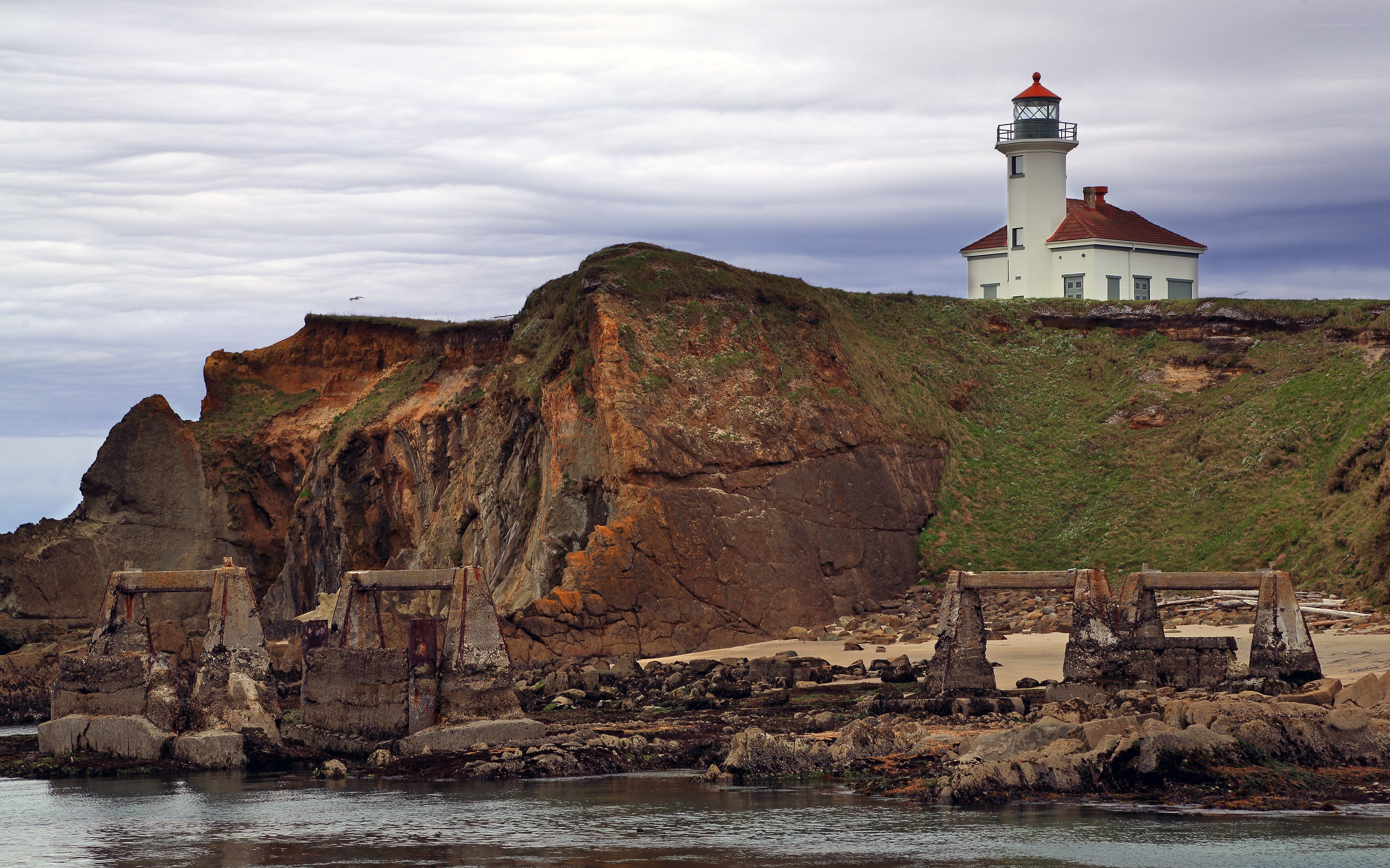 Lighthouse on a rocky cliff