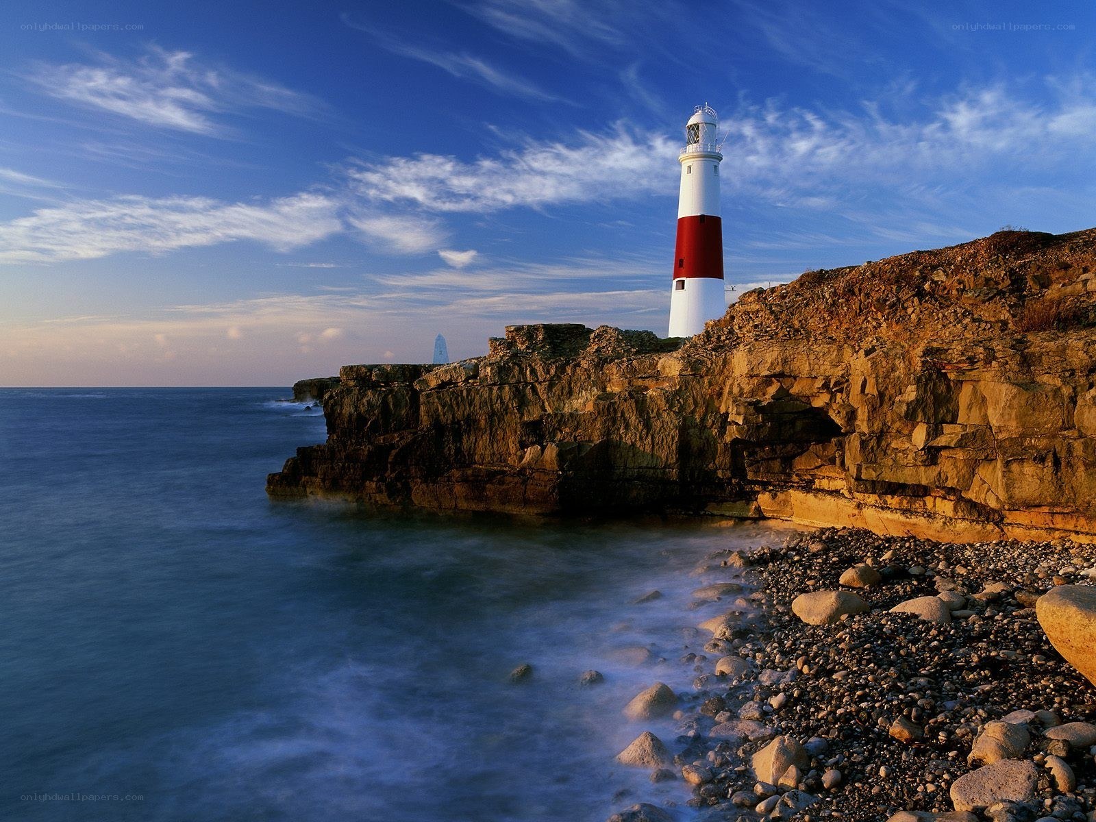 Lighthouse on a rocky cliff
