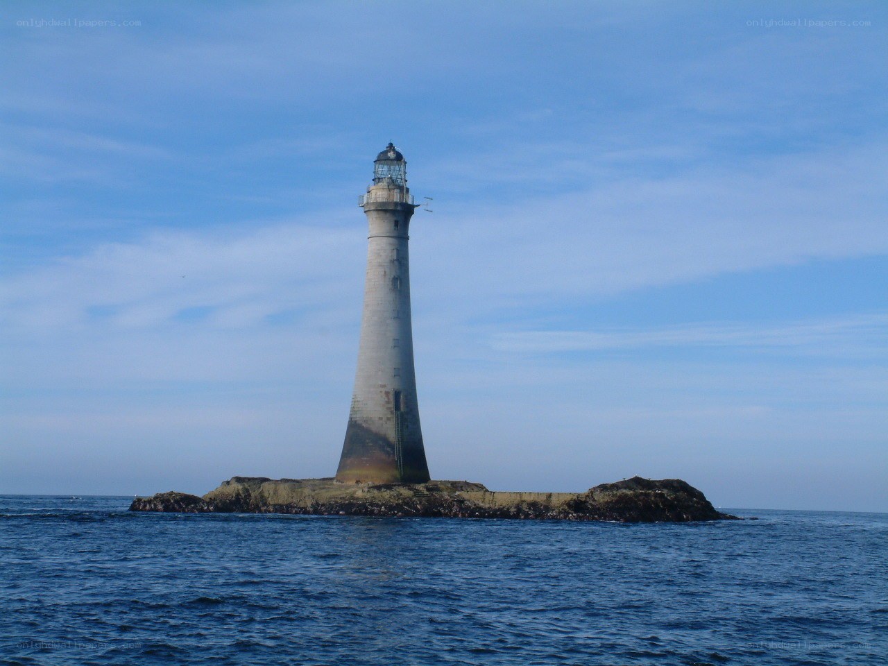 lighthouse on a rocky island