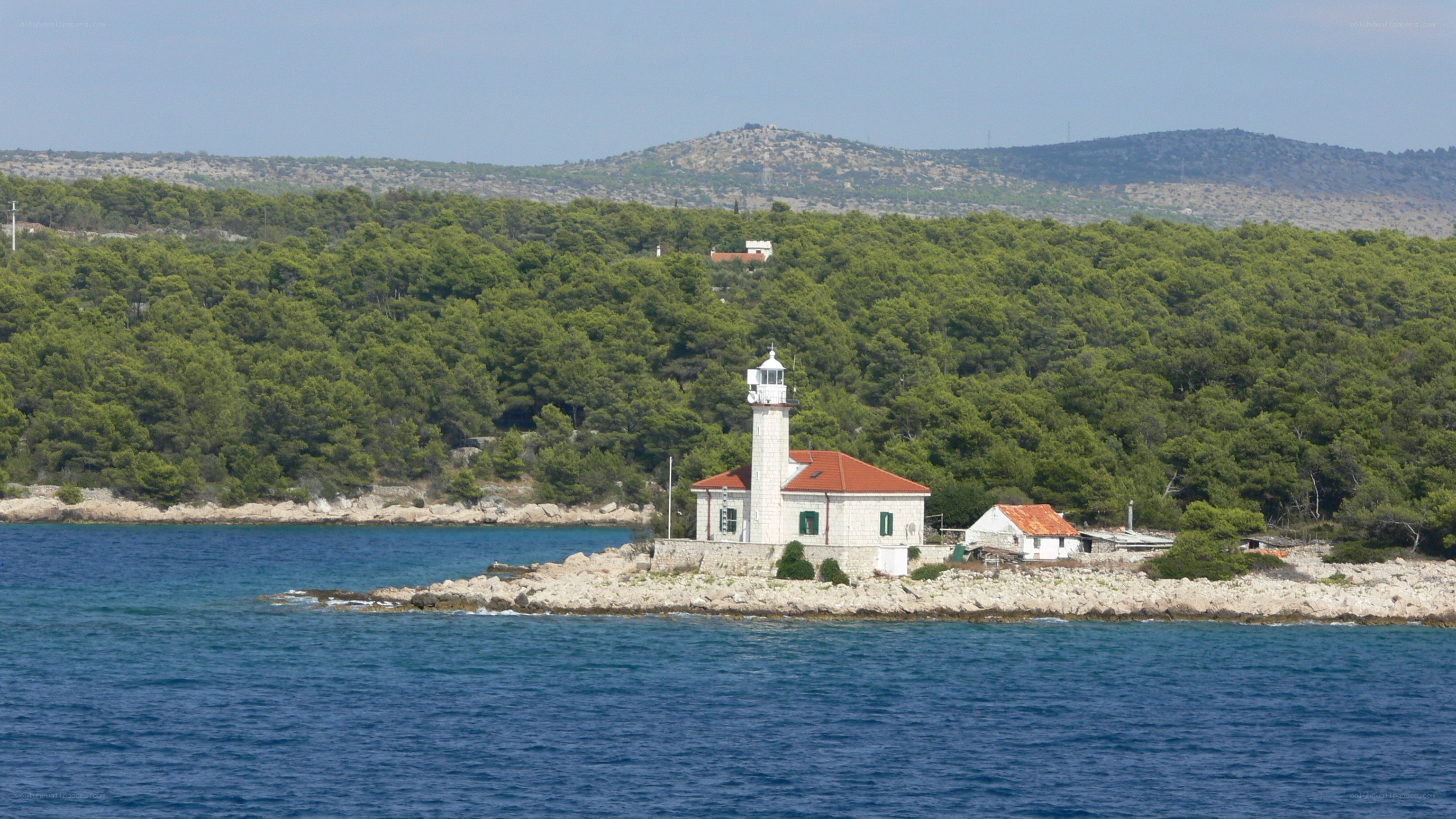 lighthouse on a rocky island