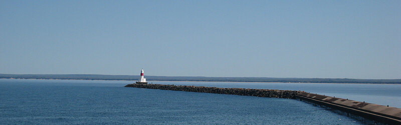 lighthouse on a rocky jetty