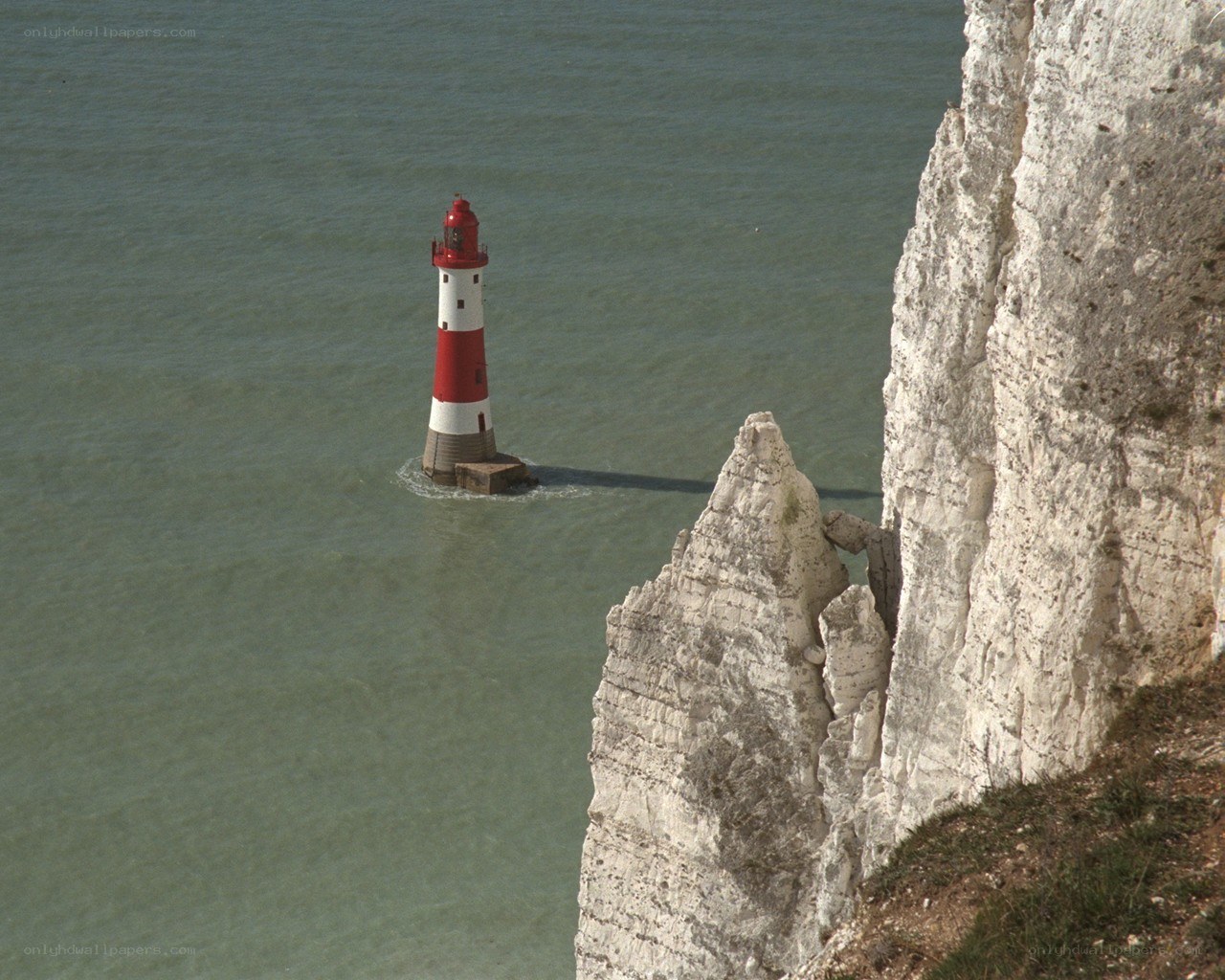 lighthouse on a rocky outcrop