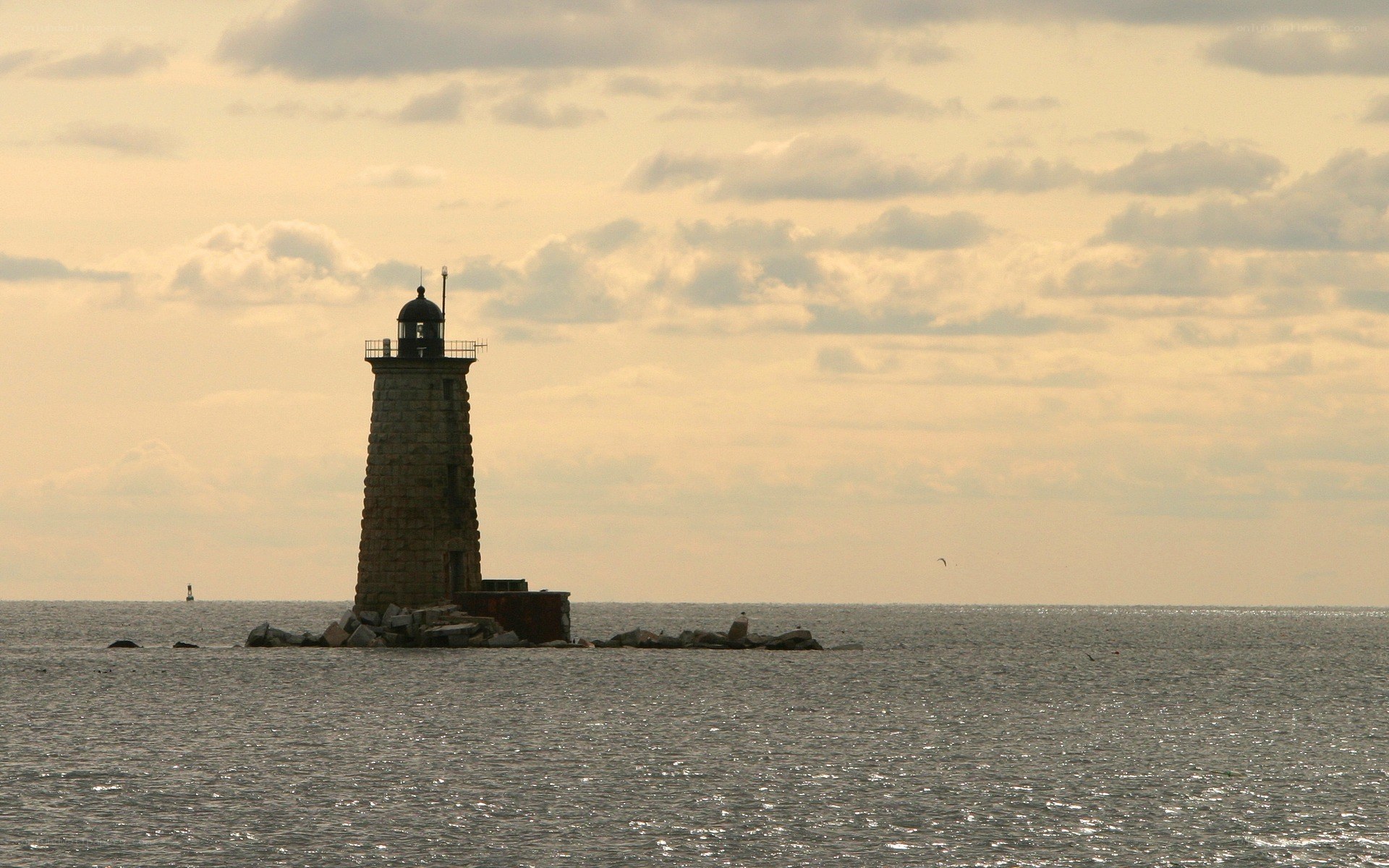 Lighthouse on a rocky outcrop