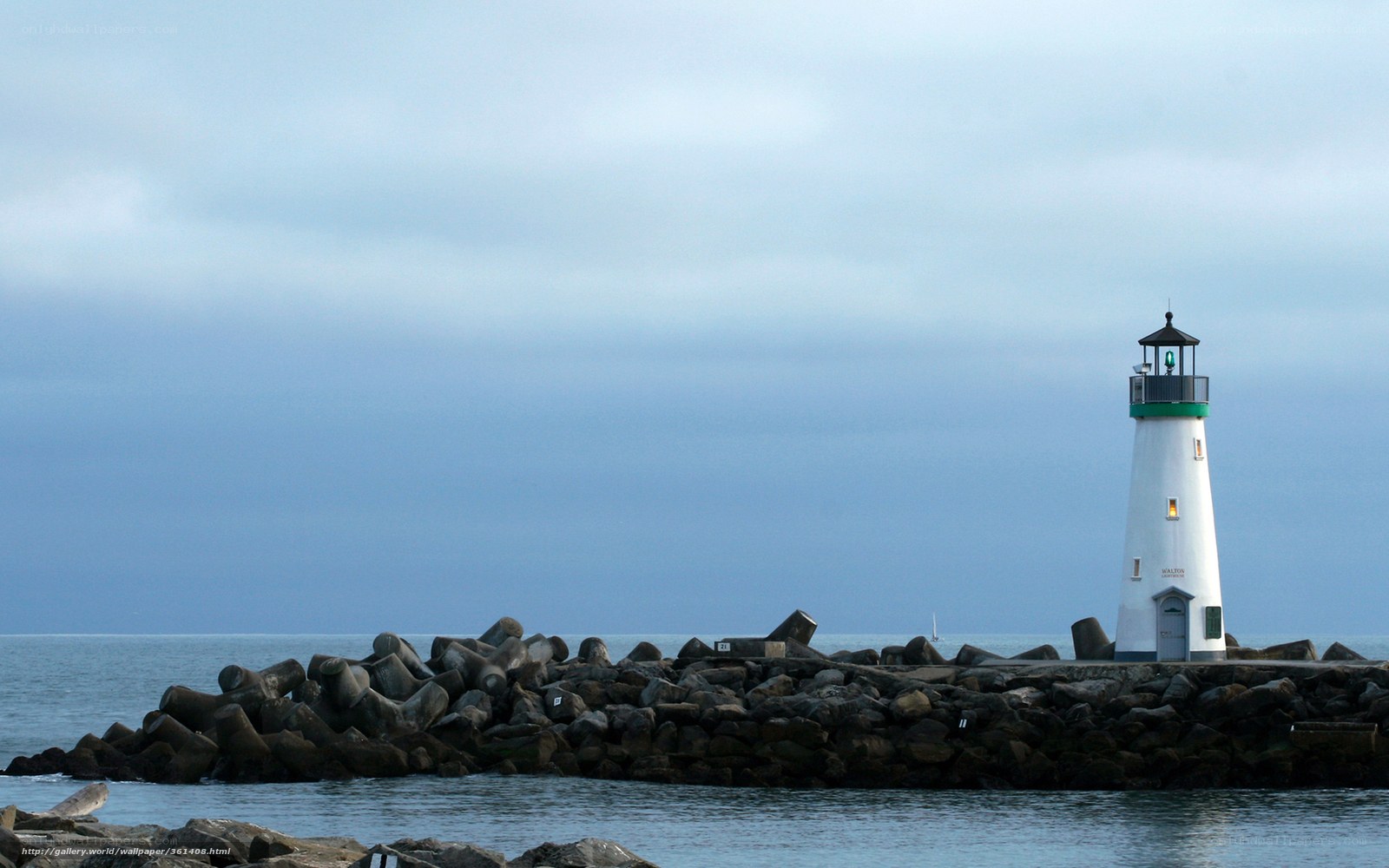 lighthouse on a rocky pier