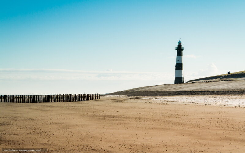 Lighthouse on a sandy beach