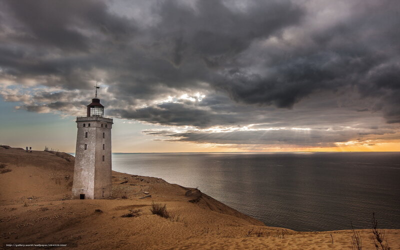 Lighthouse on a sandy cliff