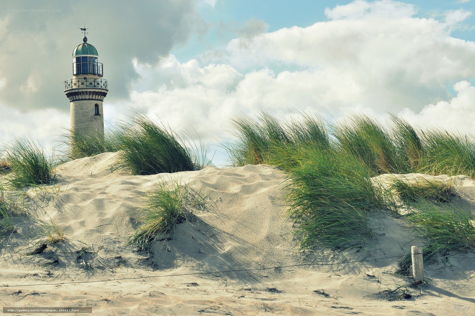 Lighthouse on a sandy dune