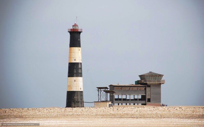 lighthouse on a sandy shore