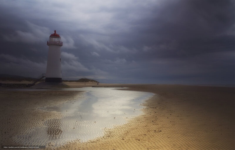 Lighthouse on a stormy beach
