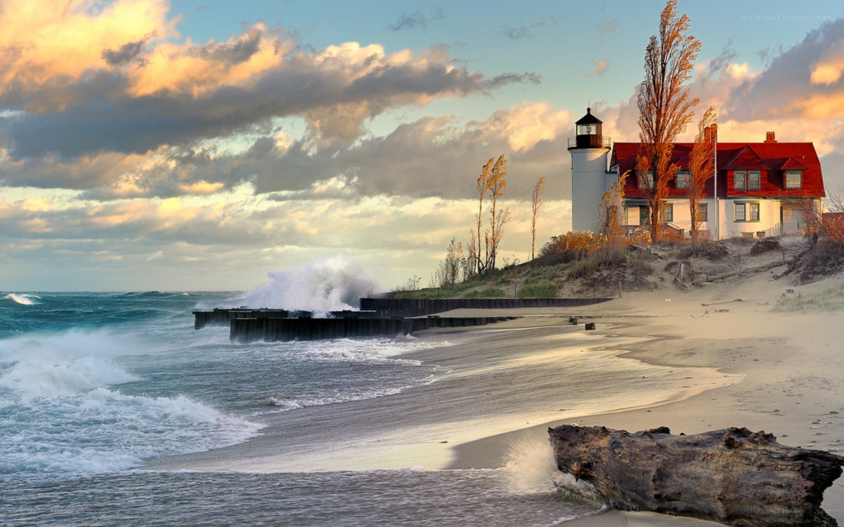 Lighthouse on a stormy beach