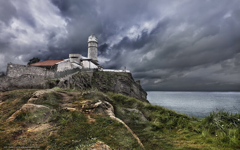 Lighthouse on a stormy cliff