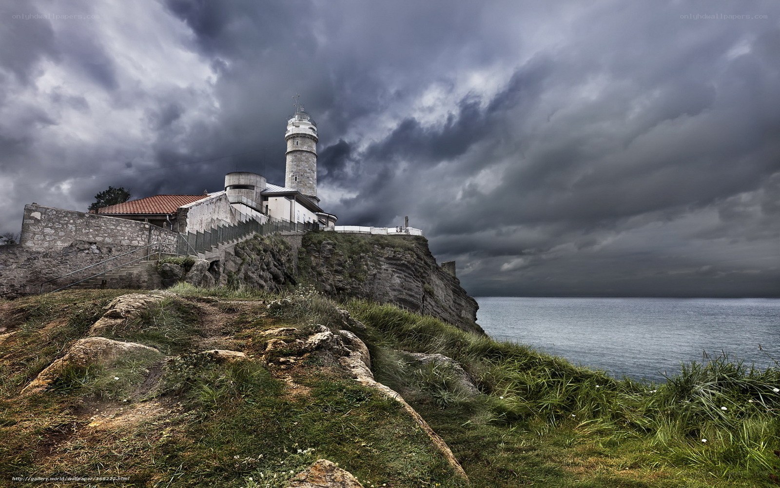 Lighthouse on a stormy cliff