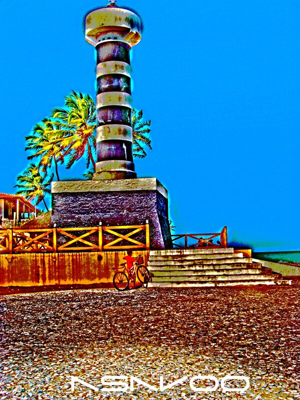 Lighthouse on a tropical beach