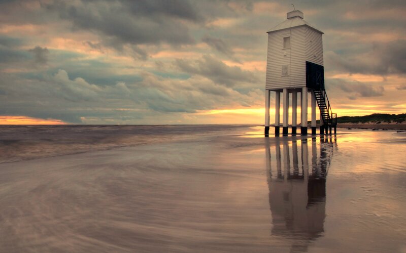 Lighthouse on Beach — Orange, Dramatic, Sunset