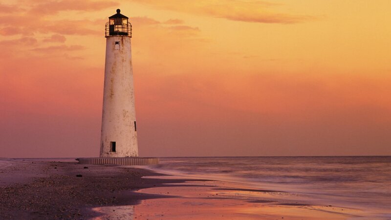 Lighthouse on Beach — Orange, Serene, Sunset, Photograph