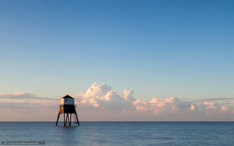lighthouse on calm sea