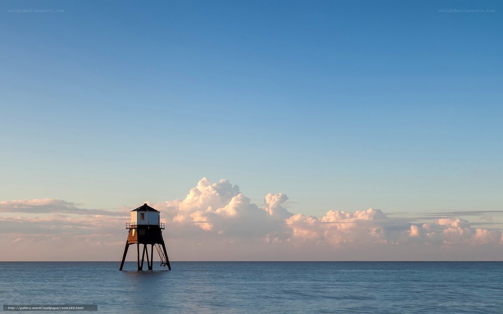 lighthouse on calm sea