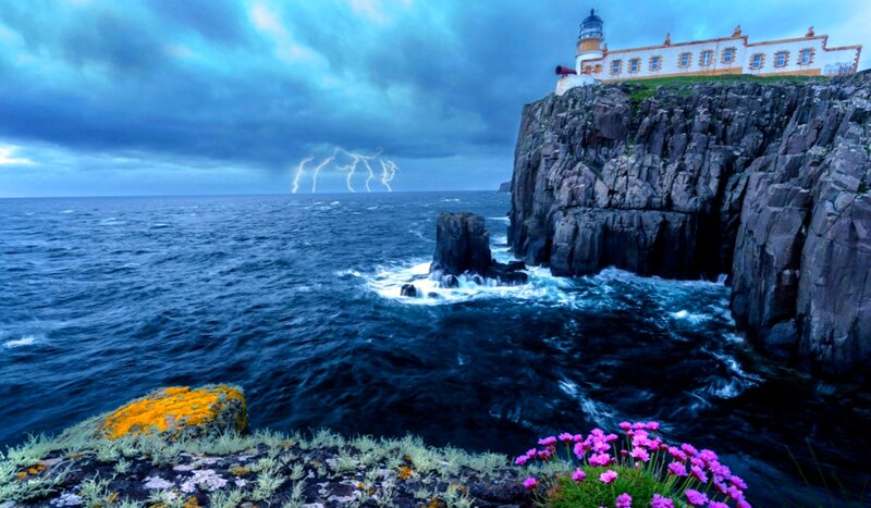 Lighthouse on Cliff — Blue, Dramatic, Night, Photograph, Lightning