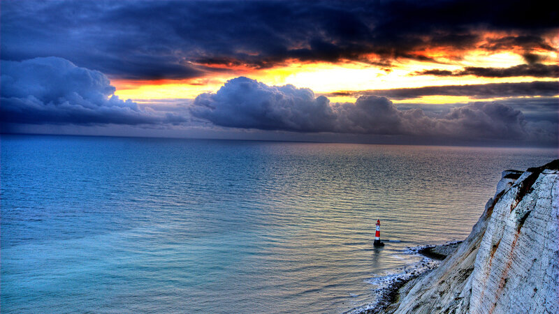 Lighthouse on Cliff — Blue, Dramatic, Sunset, Photograph, Ocean, Cliffs, Clouds