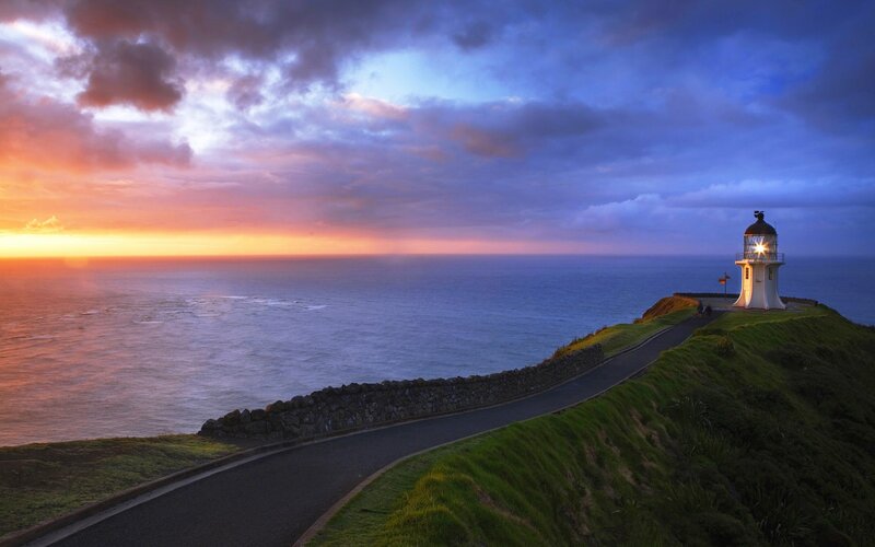 Lighthouse on Cliff — Blue, Dramatic, Sunset, Photograph, Ocean, Road, Sky