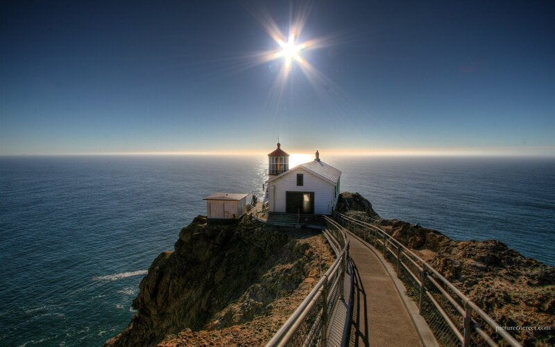 Lighthouse on Cliff — Blue, Dramatic, Sunset, Photograph, Ocean, Sun