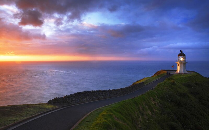 Lighthouse on Cliff — Blue, Dramatic, Sunset, Photograph, Ocean