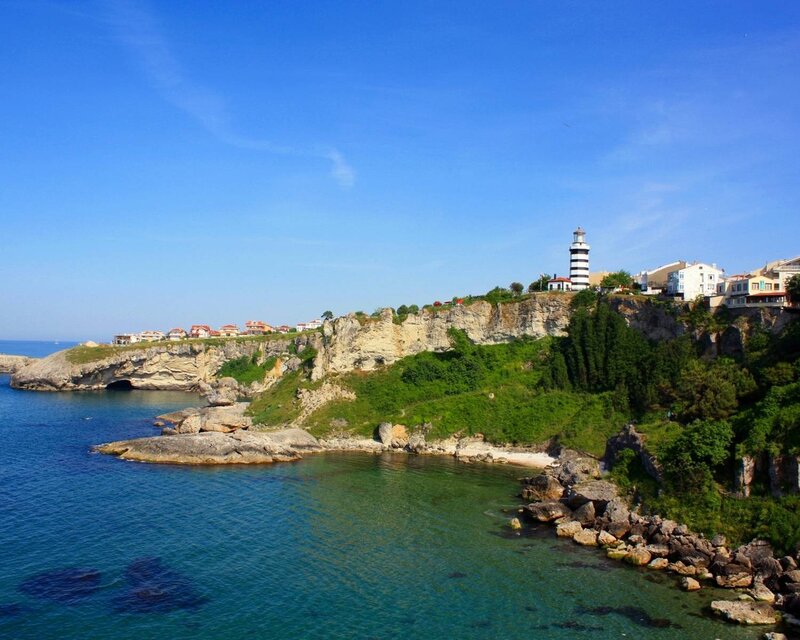 Lighthouse on Cliff — Blue, Serene, Afternoon, Photograph, Cliffs