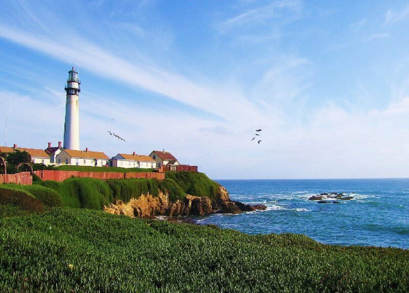 Lighthouse on Cliff — Blue, Serene, Afternoon, Photograph, Houses, Ocean