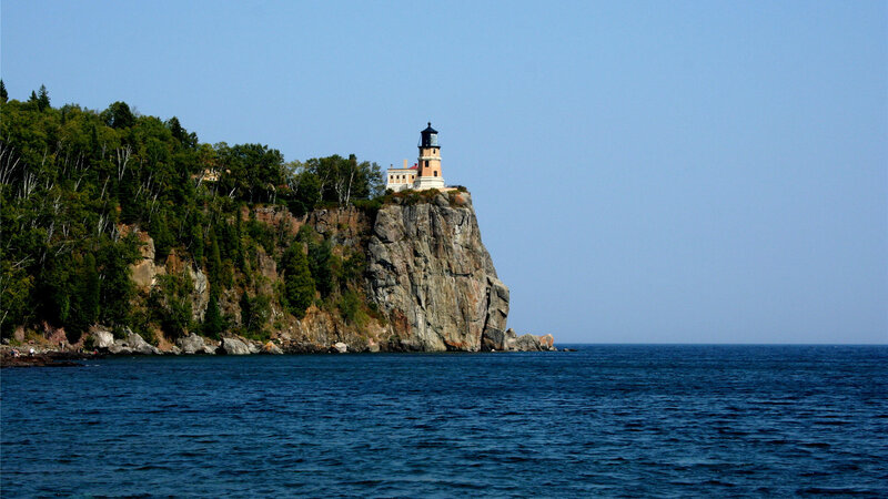 Lighthouse on Cliff — Blue, Serene, Afternoon, Photograph, Trees