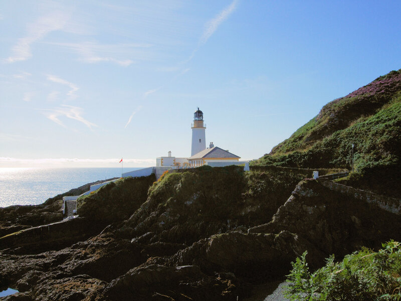 Lighthouse on Cliff — Blue, Serene, Afternoon