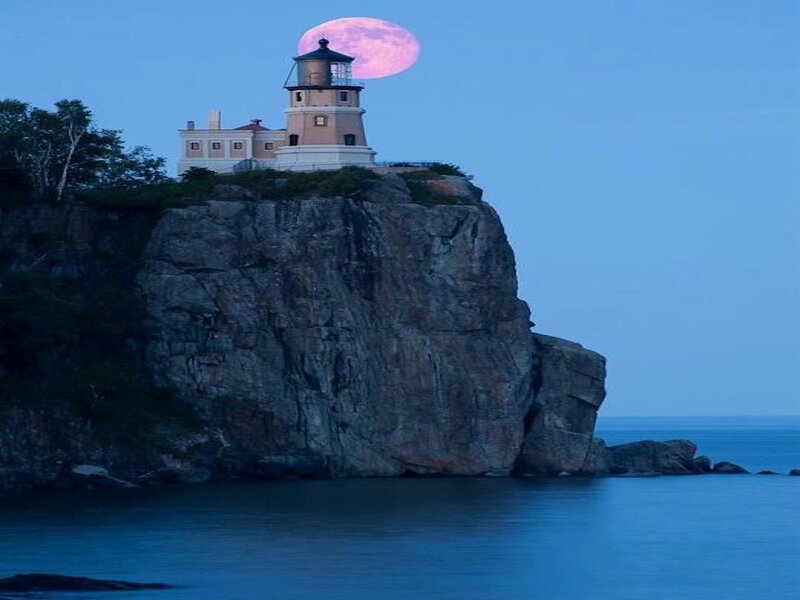 Lighthouse on Cliff — Blue, Serene, Night, Photograph, Moon, Ocean