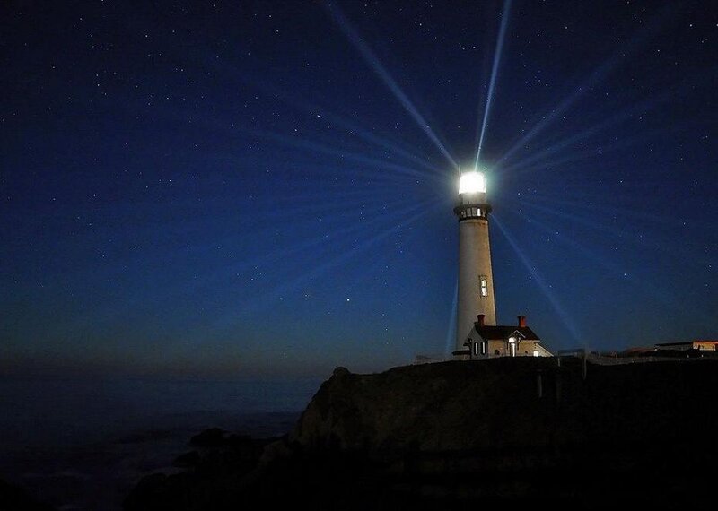Lighthouse on Cliff — Blue, Serene, Night, Photograph, Night Sky