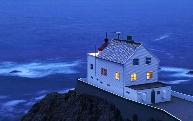 Lighthouse on Cliff — Blue, Serene, Night, Photograph, Ocean, Rocks, Windows