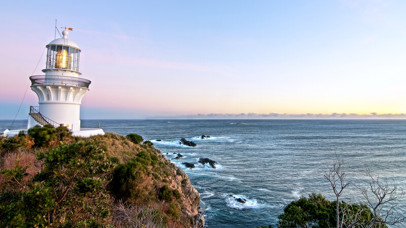 Lighthouse on Cliff — Blue, Serene, Sunset, Photograph, Ocean, Sky