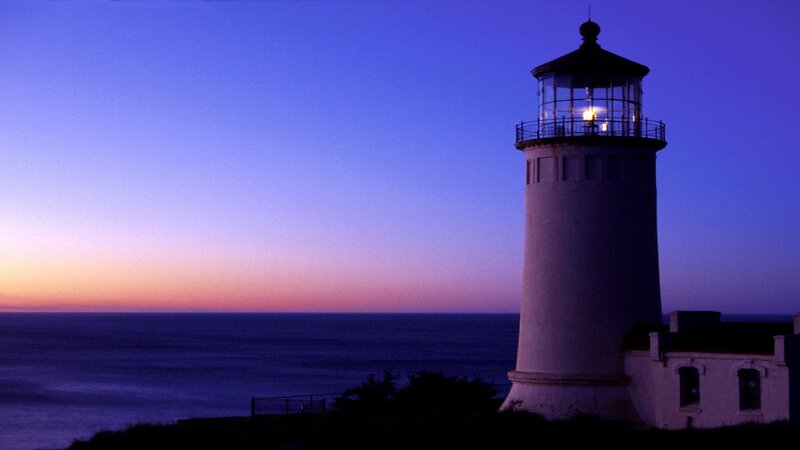 Lighthouse on Cliff — Blue, Serene, Sunset, Photograph, Ocean, Sky, Trees