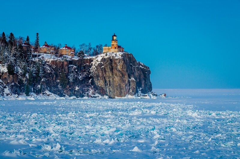 Lighthouse on Cliff — Blue, Serene, Winter