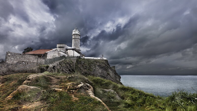 Lighthouse on Cliff — Gray, Dramatic, Photograph, Ocean