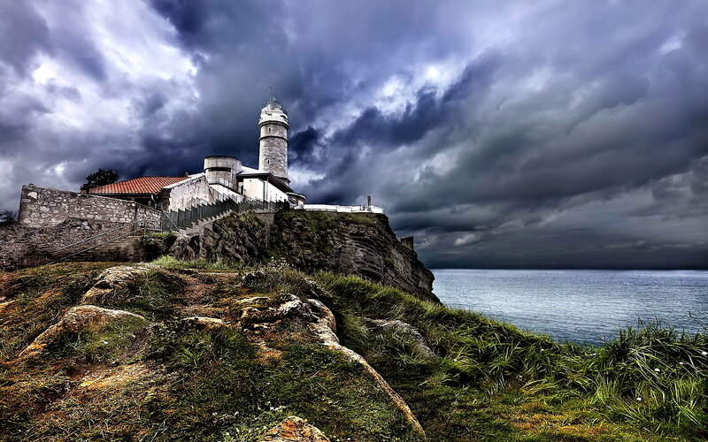 Lighthouse on Cliff — Gray, Dramatic, Photograph