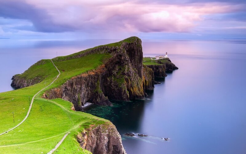 Lighthouse on Cliff — Green, Serene, Sunset, Photograph, Ocean, Path