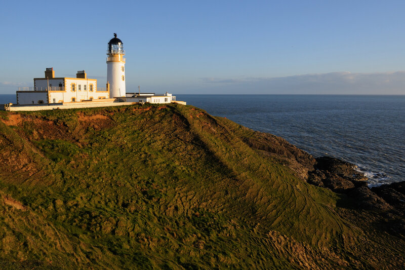 Lighthouse on Cliff — Green, Serene