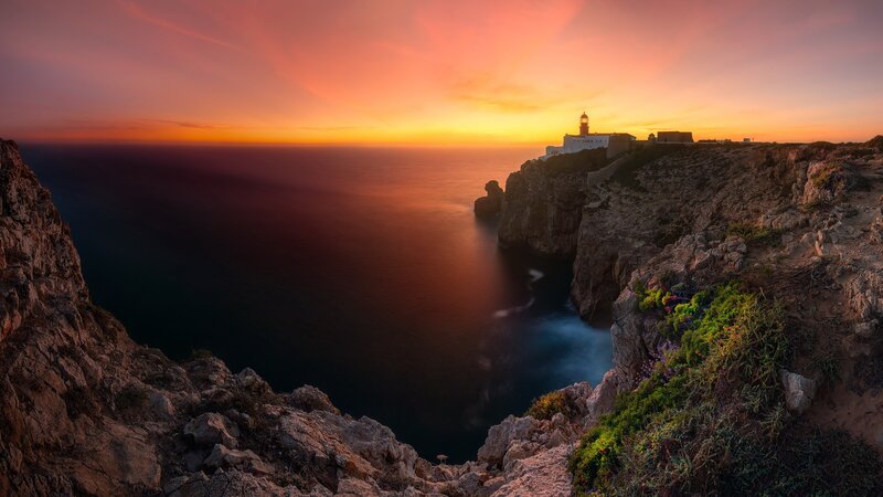 Lighthouse on Cliff — Orange, Dramatic, Sunset, Photograph, Ocean, Cliffs