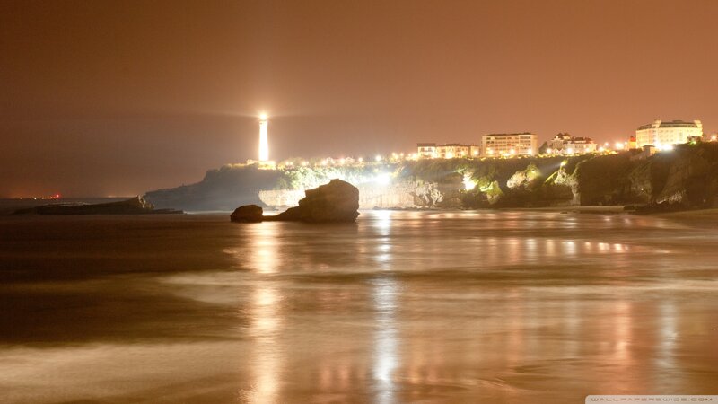 Lighthouse on Cliff — Orange, Serene, Night