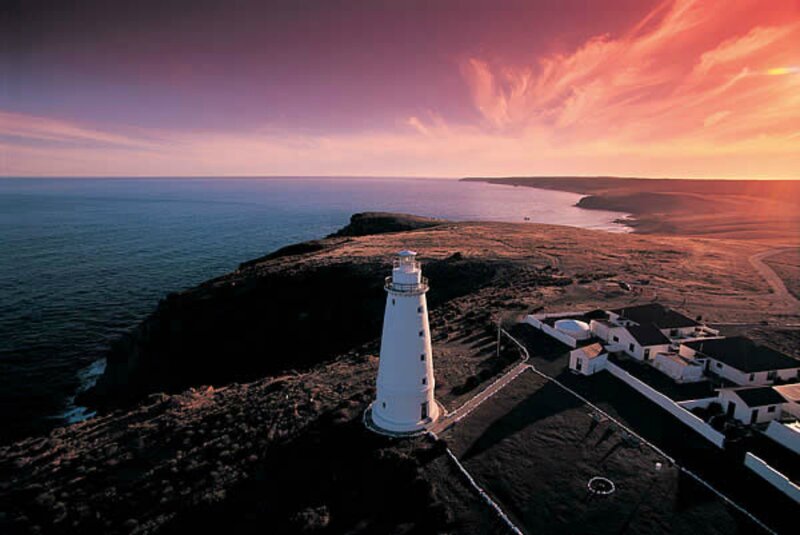 Lighthouse on Cliff — Purple, Dramatic, Sunset, Photograph