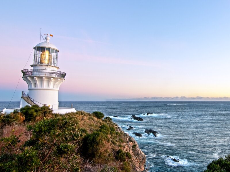 lighthouse on coastal cliff