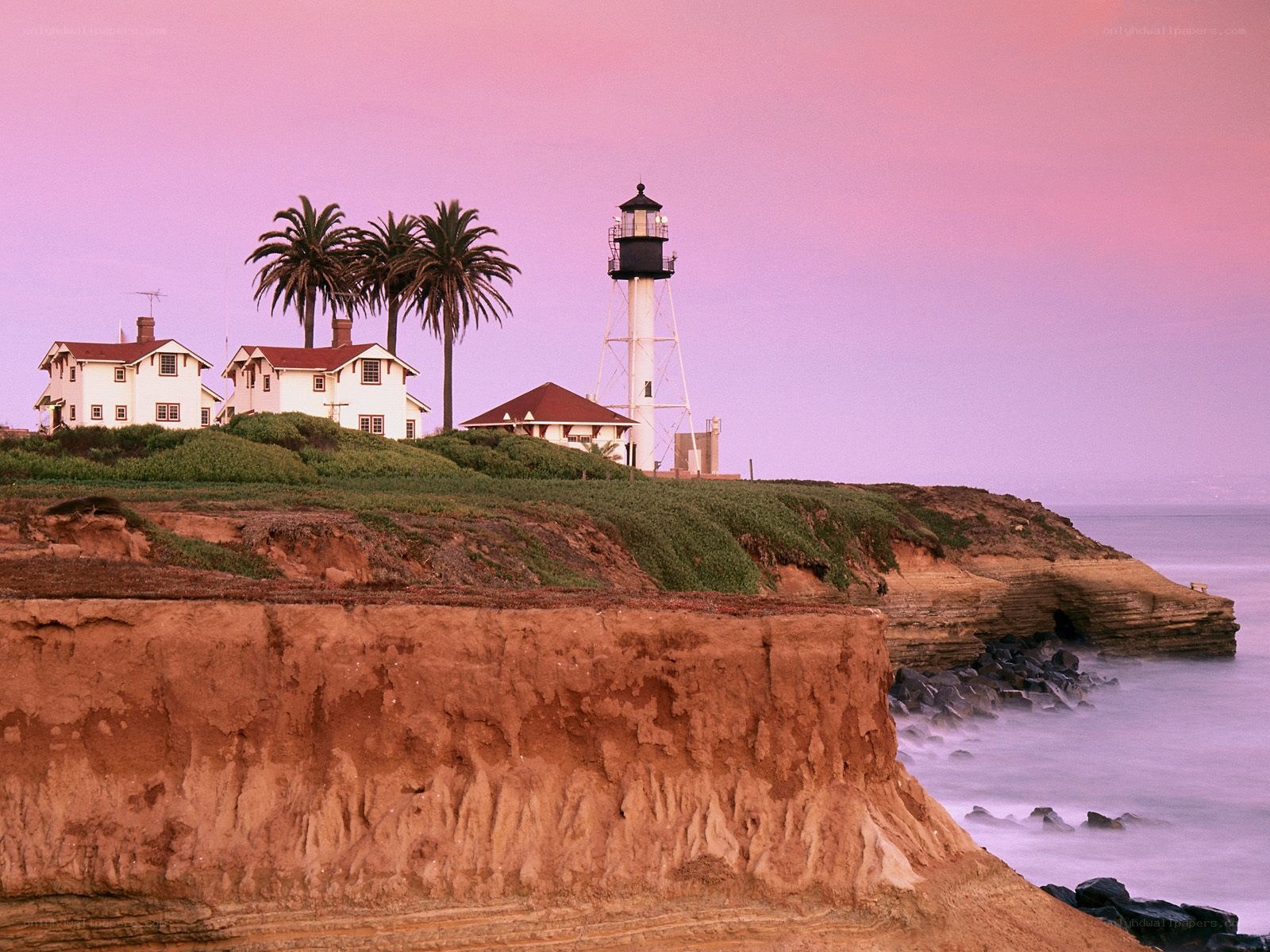 lighthouse on coastal cliff