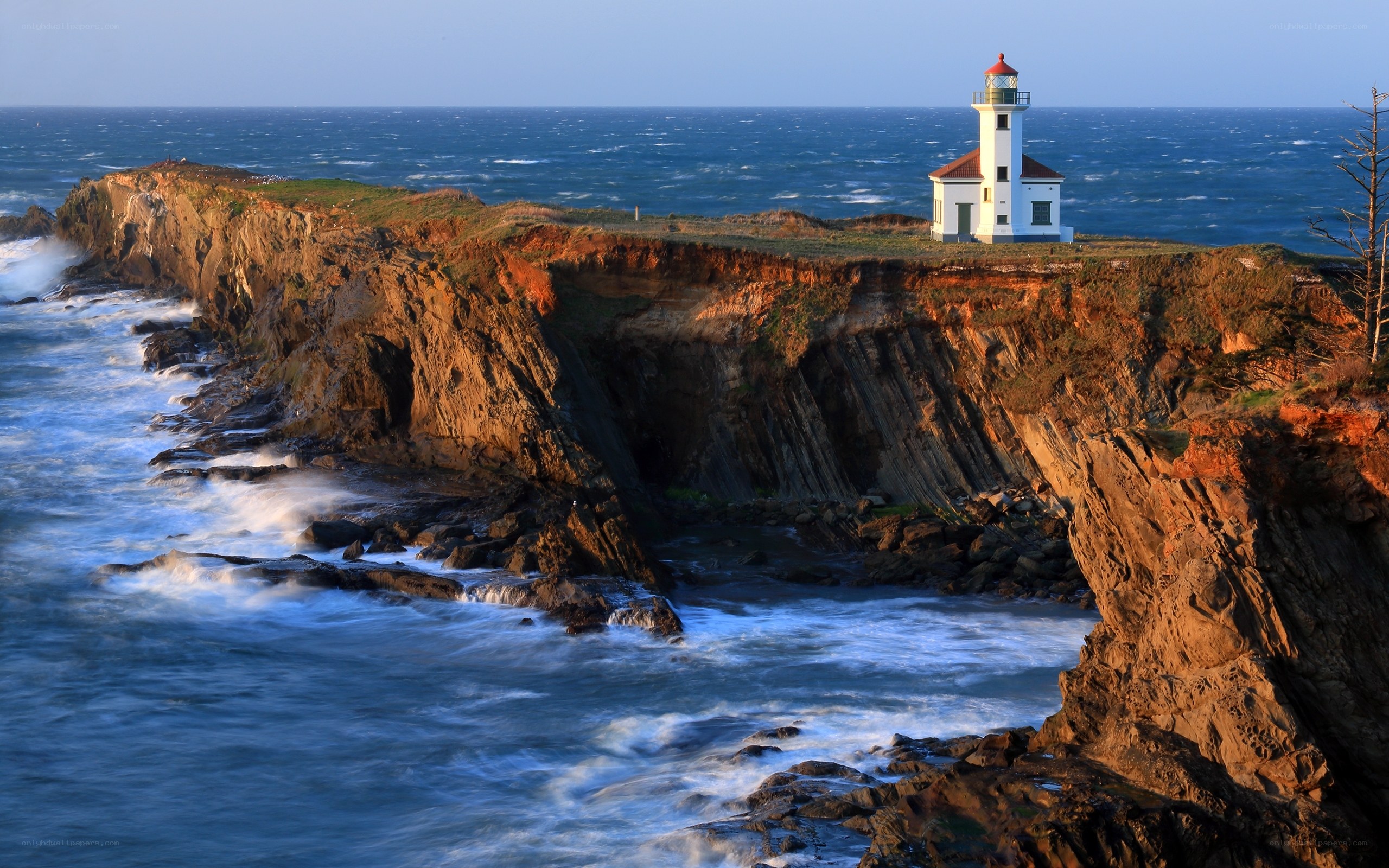 Lighthouse on coastal cliff
