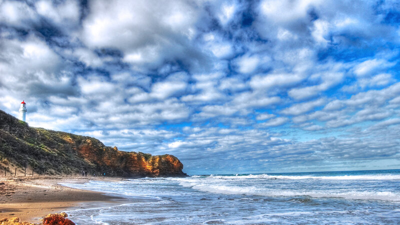 Lighthouse on Coastal Cliff — Blue, Dramatic, Afternoon