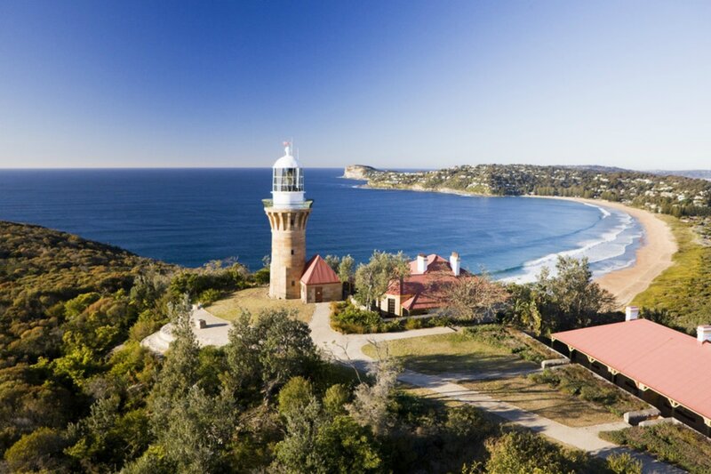 Lighthouse on Coastal Cliff — Blue, Serene, Afternoon, Photograph, Ocean, Beach