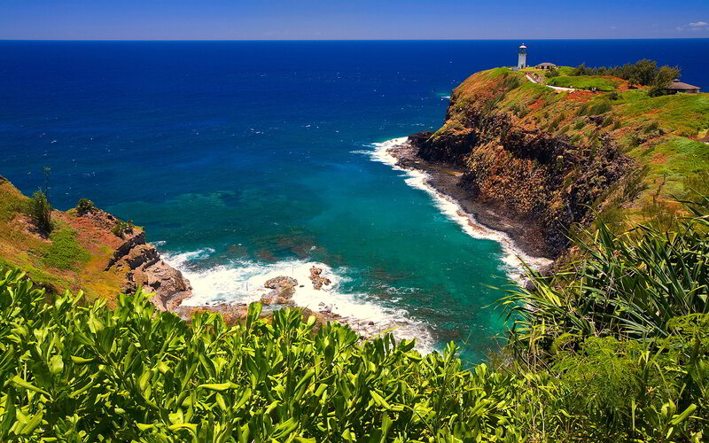 Lighthouse on Coastal Cliff — Blue, Serene, Afternoon, Photograph, Ocean, Vegetation